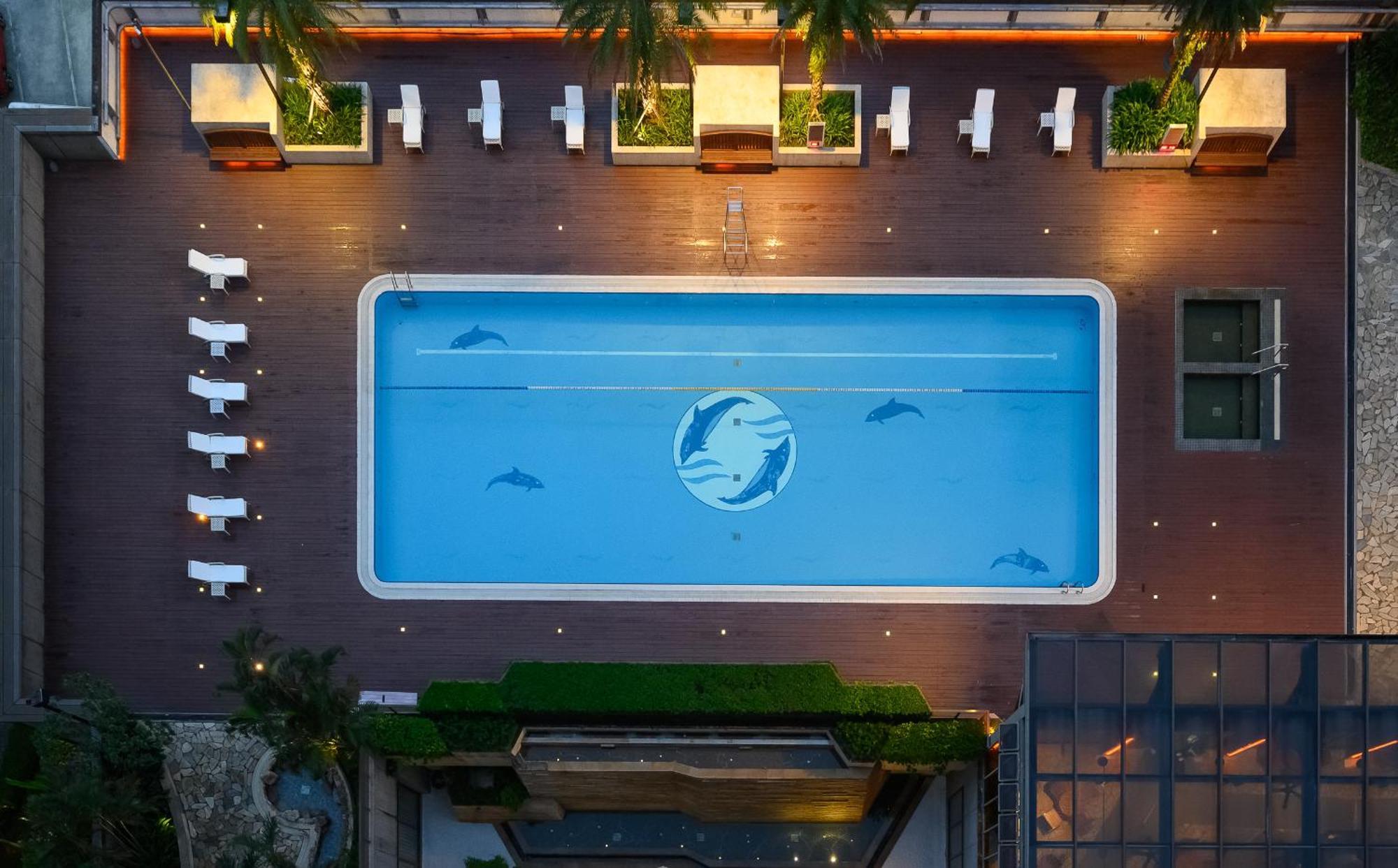 Evergreen Resort Hotel - Jiaosi Jiaoxi Εξωτερικό φωτογραφία The pool at the Dolphinarium